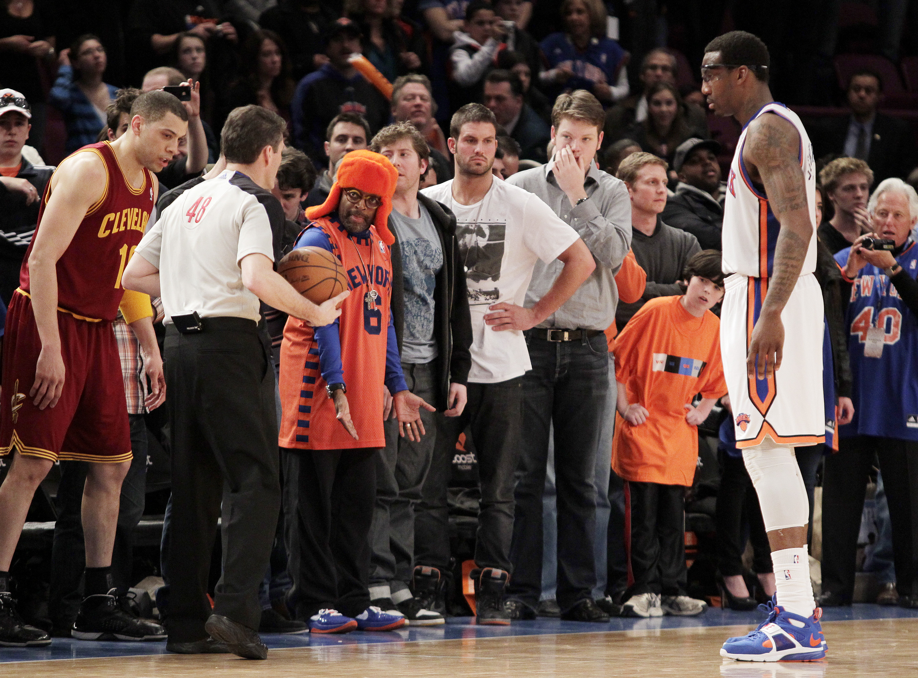 Director Spike Lee reacts next to official Scott Foster as New York Knicks Amar'e Stoudemire at Madison Square Garden in New York